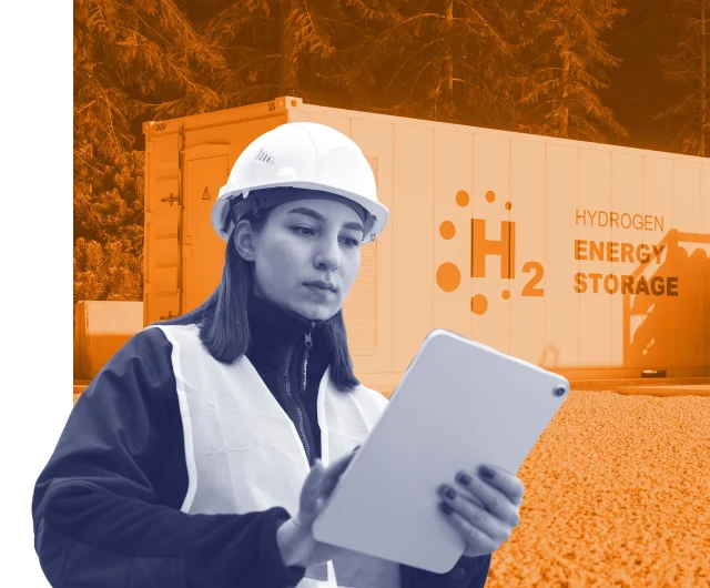 Woman in hard hat with tablet